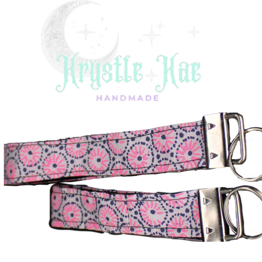 Burst of Blooms: Feminine Pink and Purple Key Fob Wristlet with Floral Pattern