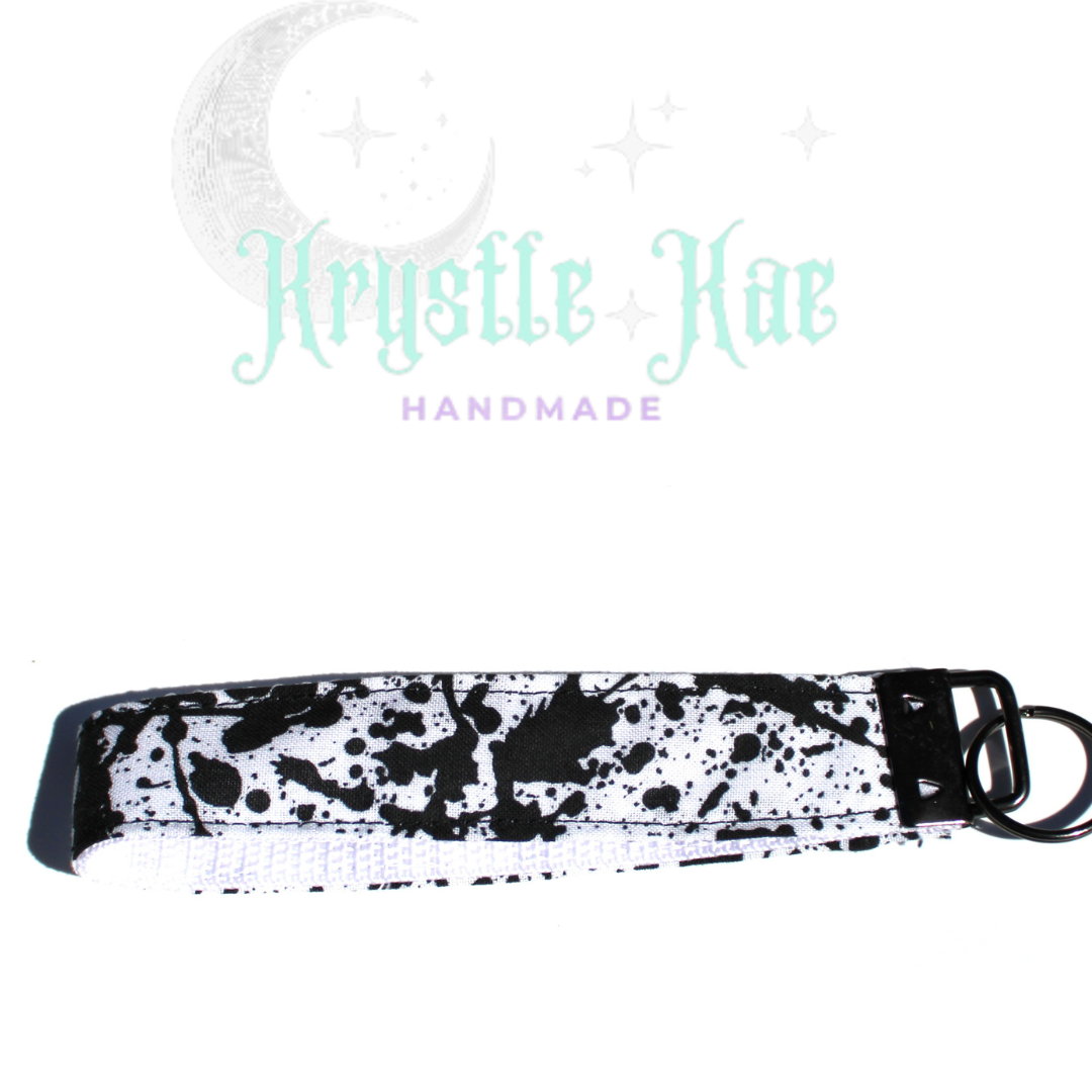 Black and white splatter Key Fob Wristlet.