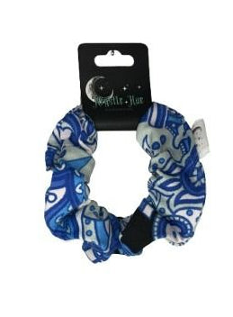 Blue and white patterned scrunchie on a white background
