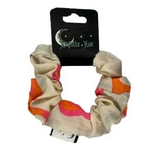 Scrunchie with colorful pattern on a white background