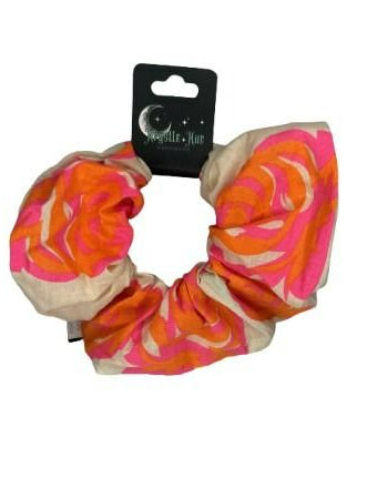 Colorful scrunchie with packaging on a white background