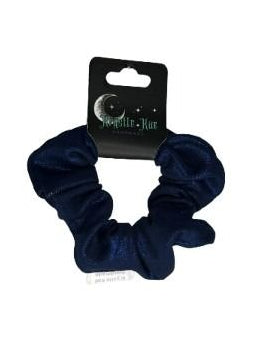 Navy blue scrunchies on a white background with a brand label.
